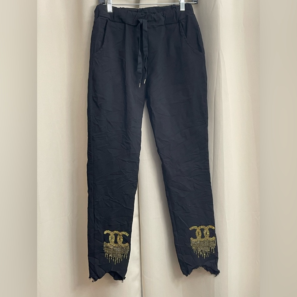 Brand Bazar pants. Studded and frayed hems.
